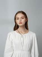 Load image into Gallery viewer, Celestial Star & Moon Layered Necklace Gold On-Hand Shot — Solisita