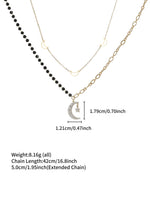 Load image into Gallery viewer, Celestial Star & Moon Layered Necklace Gold Styled Flat-Lay — Solisita