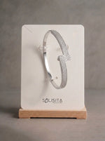 Load image into Gallery viewer, Pavé Crystal Bar Hinged Bangle Silver On-Wrist Detail — Solisita