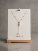 Load image into Gallery viewer, Pearl Lariat Necklace Gold Detail Close-Up — Solisita
