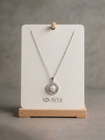 Load image into Gallery viewer, Silver Pearl Vortex Pendant White Detail Close-Up — Solisita