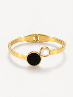 Load image into Gallery viewer, Black &amp; White Shell Geometric Bangle Gold Front View — Solisita
