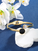 Load image into Gallery viewer, Black &amp; White Shell Geometric Bangle Gold Angle View — Solisita
