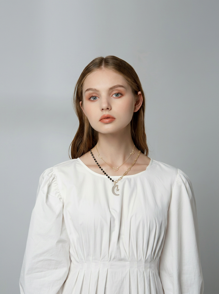 Celestial Star & Moon Layered Necklace Gold On-Hand Shot — Solisita