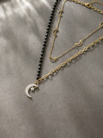 Load image into Gallery viewer, Celestial Star &amp; Moon Layered Necklace Gold Angle View — Solisita
