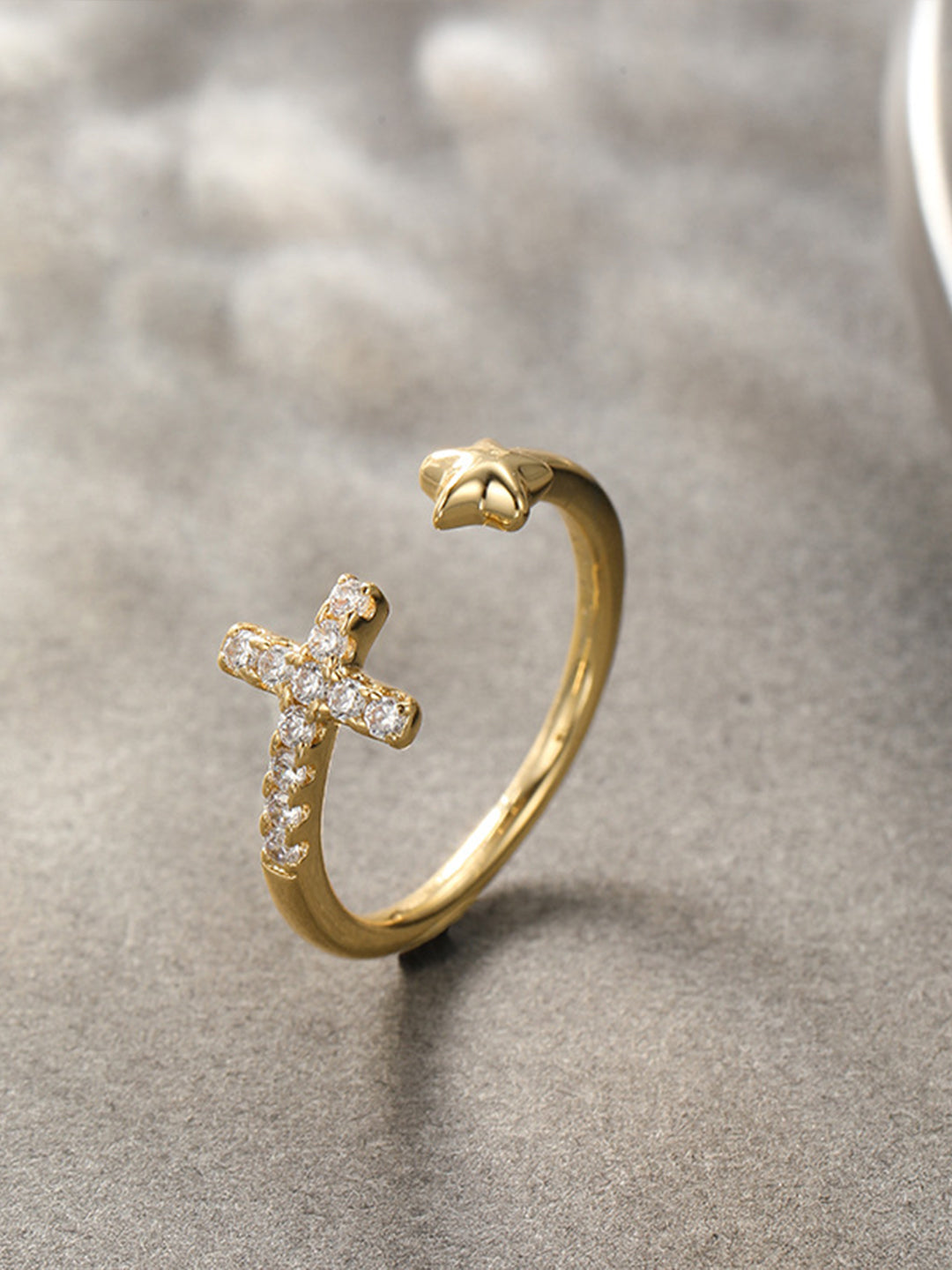 Crystal Cross & Star Open Ring Gold Flat-Lay on Surface — Solisita