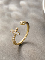 Load image into Gallery viewer, Crystal Cross &amp; Star Open Ring Gold Flat-Lay on Surface — Solisita
