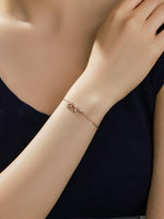 Load image into Gallery viewer, Crystal Leaf Branch Bracelet Gold On-Wrist Shot — Solisita
