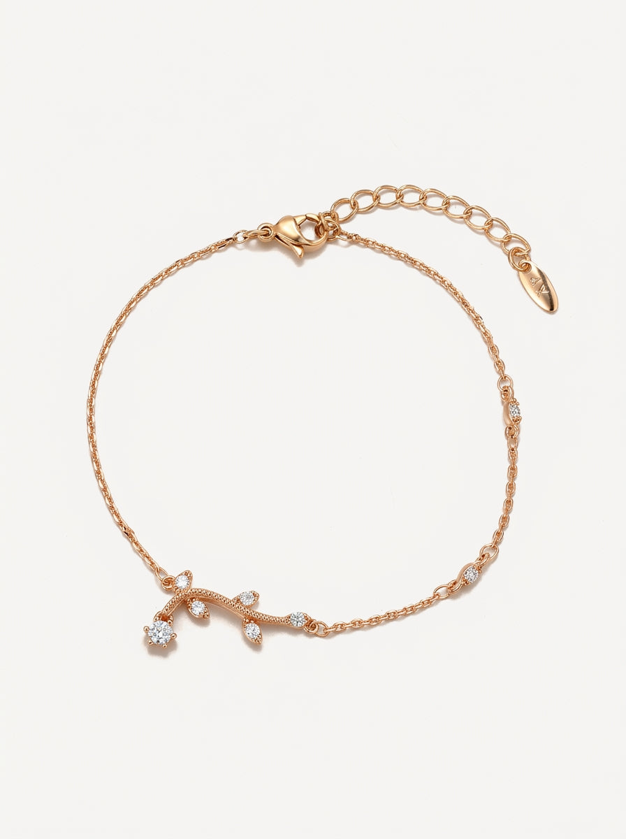 Crystal leaf branch bracelet gold front view — solisita