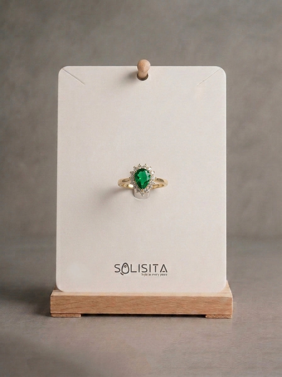 Crystal Teardrop Halo Ring Gold Flat-Lay — Solisita
