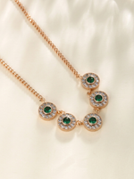 Load image into Gallery viewer, Emerald Green Halo Disc Necklace Gold Angle Shot — Solisita
