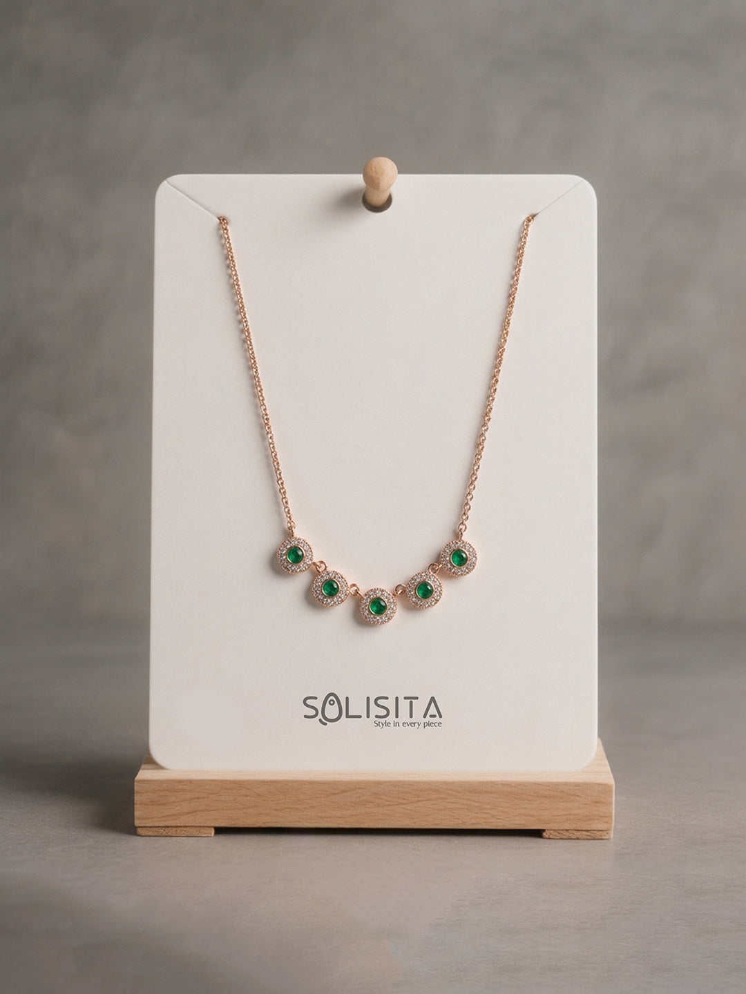 Emerald Green Halo Disc Necklace Gold Close-Up Detail — Solisita