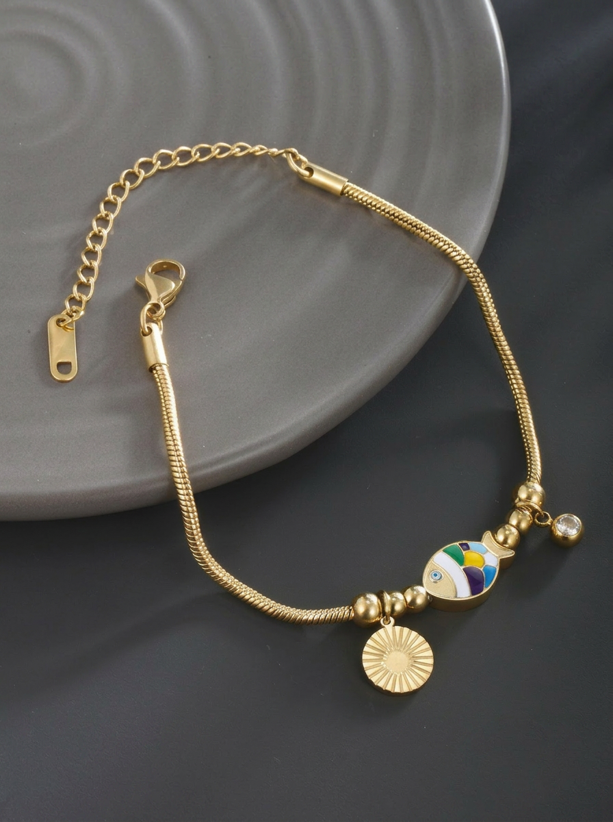 Enamel Fish & Sun Charm Bracelet Gold Angle View — Solisita