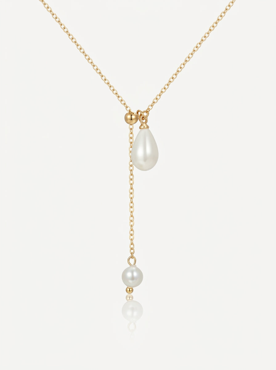 Pearl lariat necklace gold front view — solisita