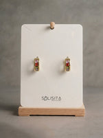 Load image into Gallery viewer, Rainbow Crystal Huggie Earrings Gold Close-Up Detail — Solisita
