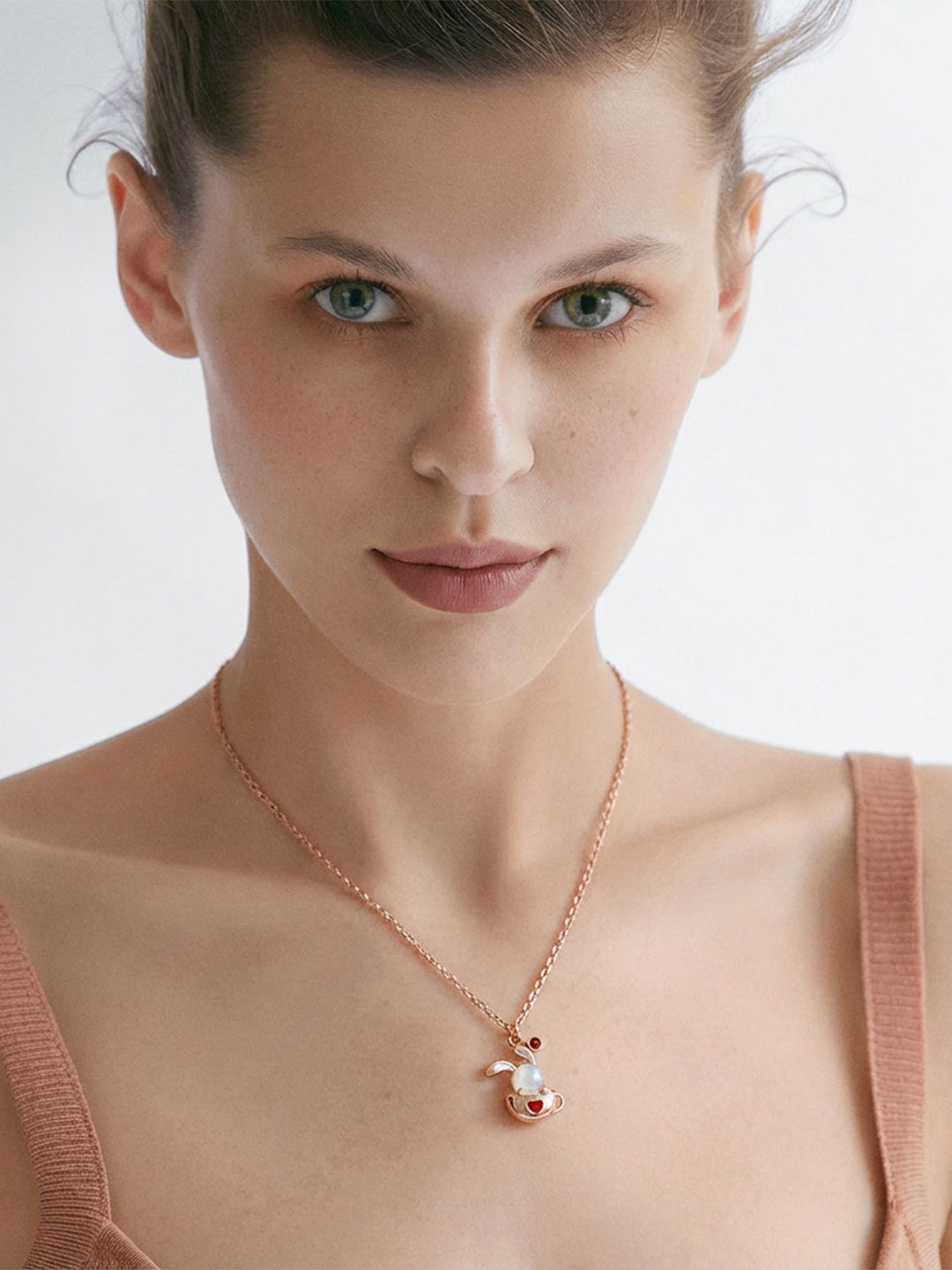 Rose gold bunny & pearl necklace gold tone side view — solisita