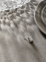 Load image into Gallery viewer, Pavé Crystal Circle Pendant Silver Flat-Lay Styled — Solisita
