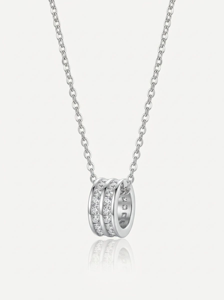Pavé crystal circle pendant silver front view — solisita