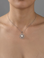 Load image into Gallery viewer, Silver Pearl Vortex Pendant White Side View — Solisita

