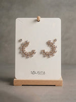 Load image into Gallery viewer, Sunburst Crystal C-Hoop Earrings Gold Flat-Lay Styled — Solisita
