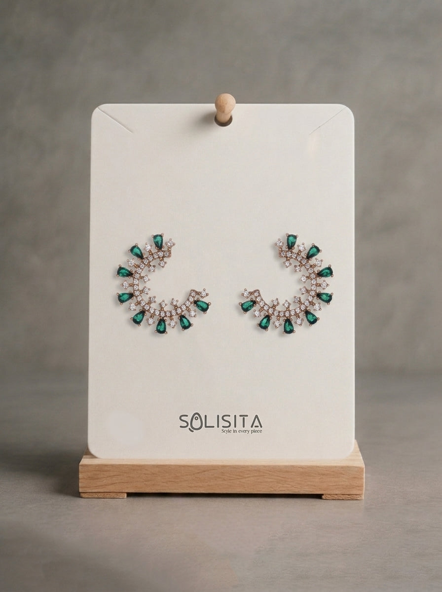 Sunburst crystal c hoop earrings gold detail close up — solisita