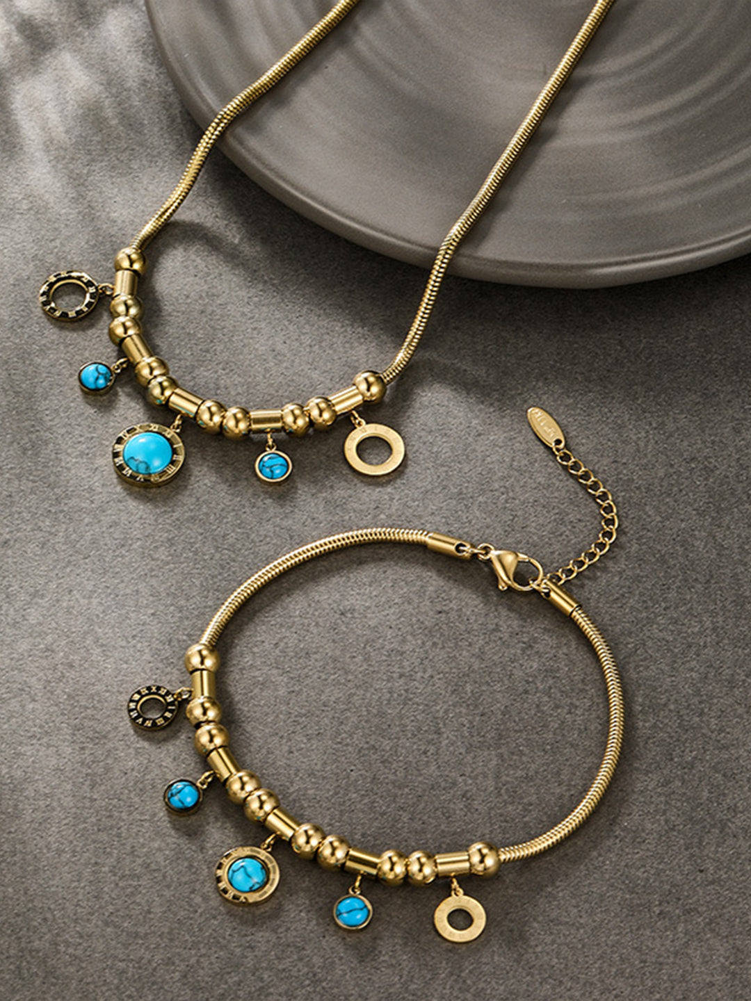 Turquoise & roman numeral snake chain set gold tone front view — solisita