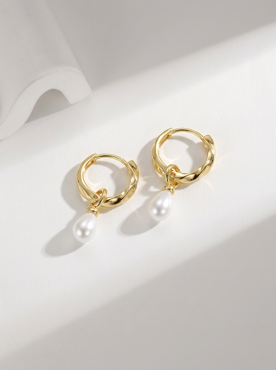 Twisted Pearl Drop Earrings Gold Flat-Lay Styled — Solisita