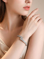 Load image into Gallery viewer, Pavé Crystal Bar Hinged Bangle Silver Close-Up Crystal Texture — Solisita
