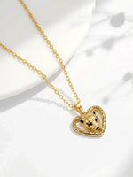 Load image into Gallery viewer, Vintage Panther Heart Pendant Gold Angle With Light — Solisita
