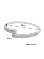 Load image into Gallery viewer, Pavé Crystal Bar Hinged Bangle Silver Flat-Lay Styled — Solisita
